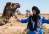 Amazigh people wearing traditional clothing in a Moroccan village