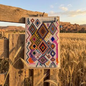 Framed Hand-Tufted Berber Wool Wall Art – Colorful Atlas Symbols Design