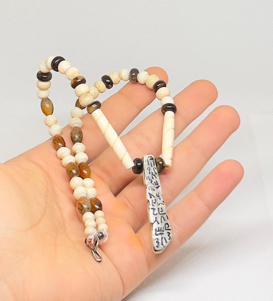 Antique African Bone Necklace: Wolf Fang Talisman, Tribal Jewelry