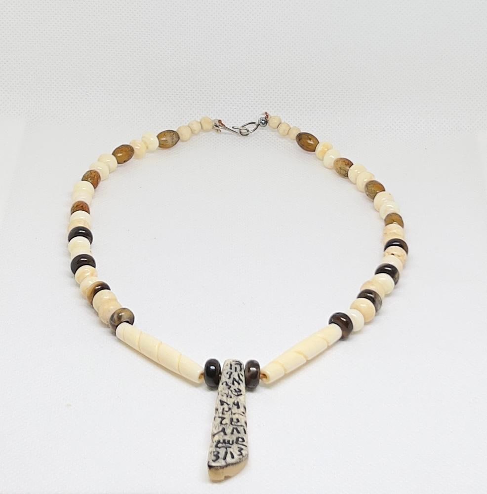 Antique African Bone Necklace: Wolf Fang Talisman, Tribal Jewelry