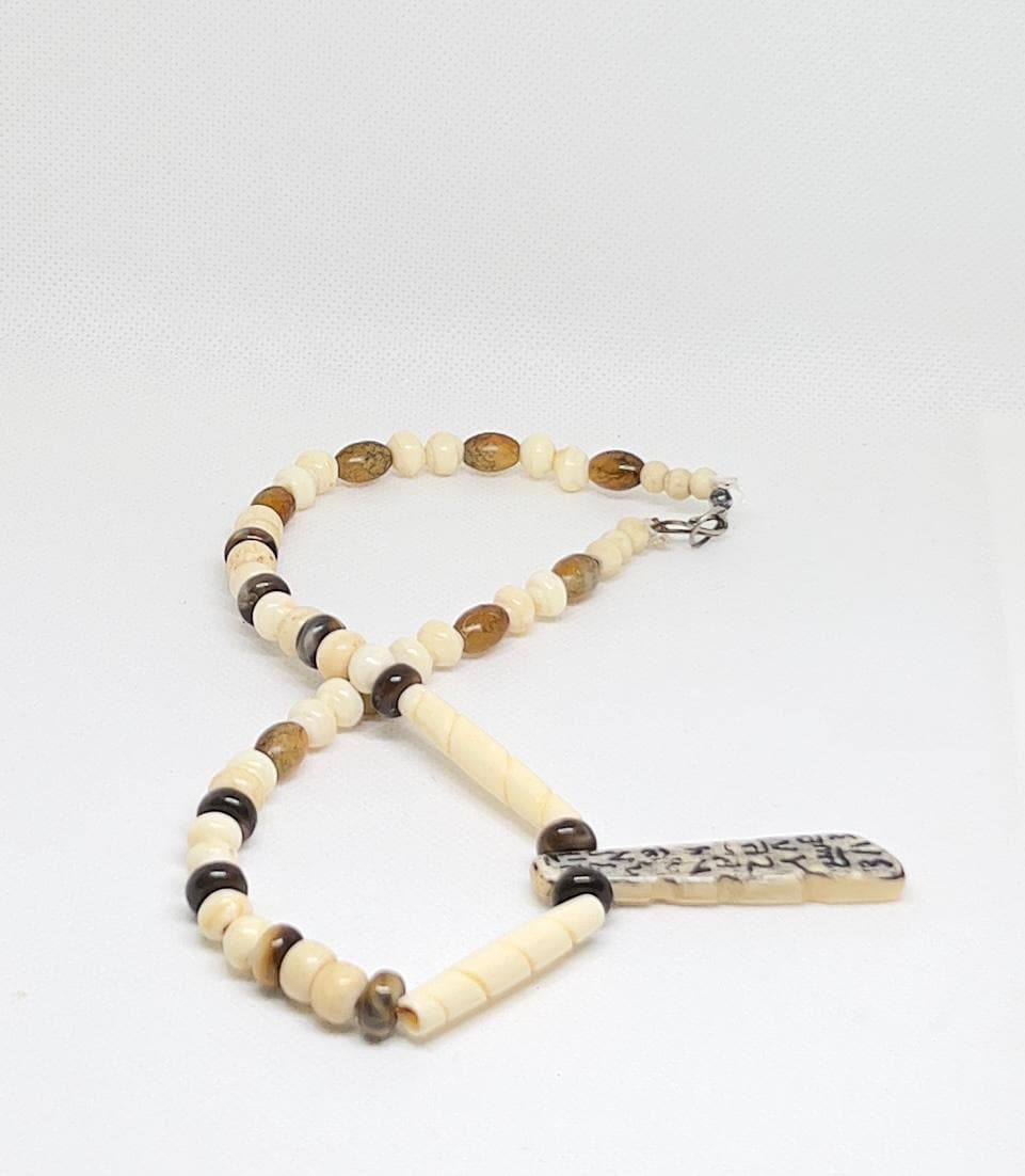 Antique African Bone Necklace: Wolf Fang Talisman, Tribal Jewelry