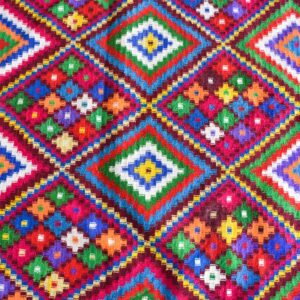 Traditional Amazigh Sahara Artisanal Rug with Colorful Berber Design